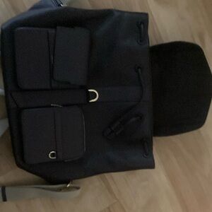 Chic Black Backpack with Dual Front Pockets